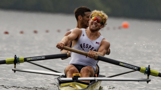 rowing boat, leaning out